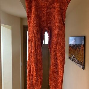 Athleta Orange Snake Print Leggings